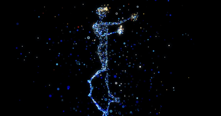 a person standing in the air with a star in their hand