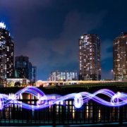 city skyline with lights turned on during night time